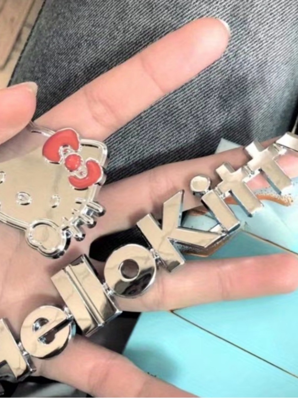 Hello Kitty chrome car emblem set.